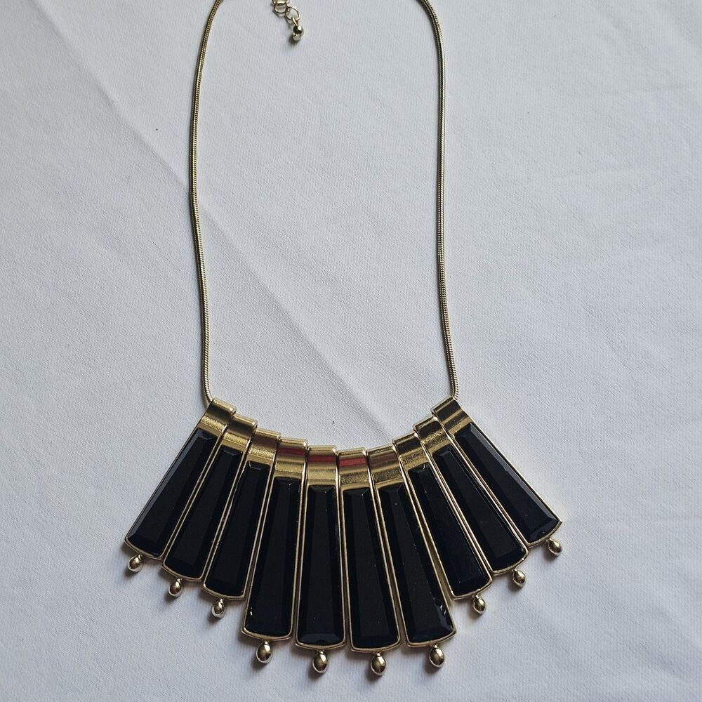 Vintage-style black and gold-tone fan trapezoid bib statement necklace